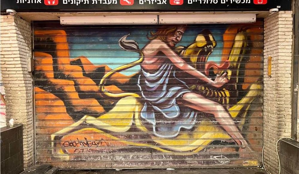 photo of The face of the market: a night graffiti tour of the Mahane Yehuda market