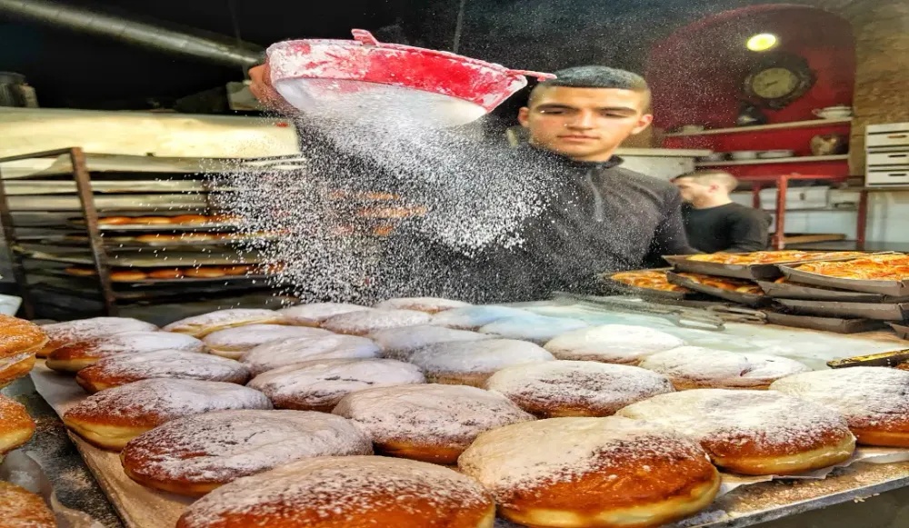 Sufganiyot – A Bakery Preparing the Doughnuts Traditionally Eaten During Chanukah
