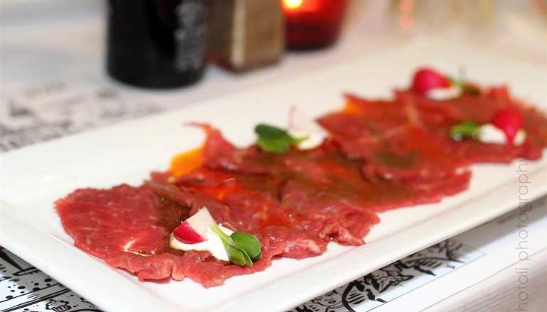 Red Heifer Carnes y Asador